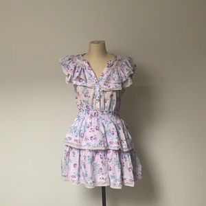 Hi! This purple floral dress is a size Medium.
